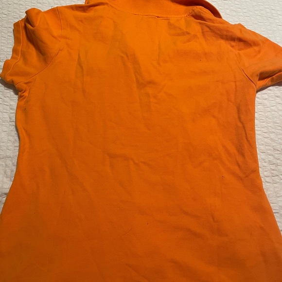 Women’s Orange Express Shirt with a cute lion design on the chest - Picture 3 of 3